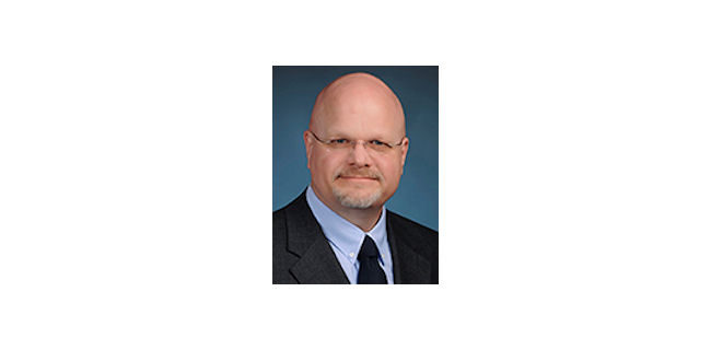 headshot: Dr. Stuart Mitchell