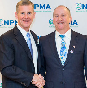 Gen. Stanley McChrystal, left, shakes the hand of Marty Overline during the NPMA PestWorld event in February. PHOTO: Pennsylvania Pest Management Association