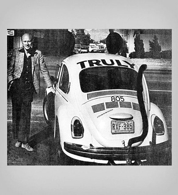 Truly David Nolen stands with the 1961 VW Beetle that started the Mouse Car fleet — a company tradition that continues today with modern Beetles, and permeates the company’s marketing, logo, etc.