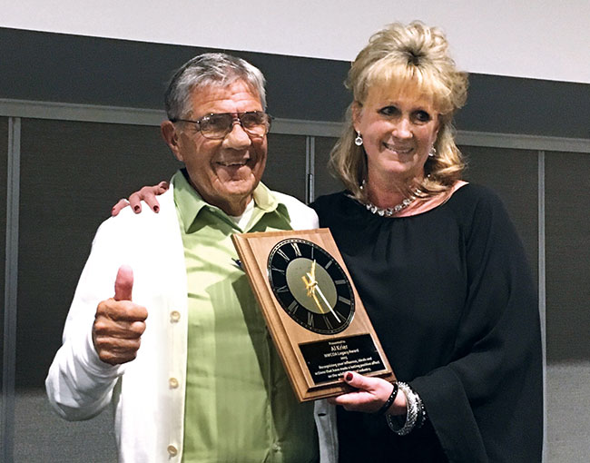 Al Krier, CWCP, A&D Animal Control, Lake Orion, Mich., receives the NWCOA Legacy Award.