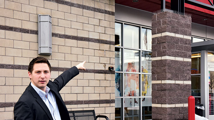 Look up at the bird deterrents installed atop this store’s support columns. Photo: ©Fred Miller Photography