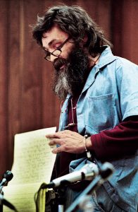 Charles Manson reads a statement at his 1986 parole hearing in San Quentin.  Photo: ©corbis.com/Bettmann