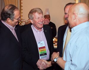 Treleven greets retired CEO (and fellow Hall of Famer) Bob Rosenberg at PestWorld.  Photo: Larry Treleven