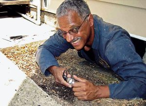 Dr. Vernard Lewis still crawls under the occasional house before retirement. Photo: Dr. Vernard Lewis 