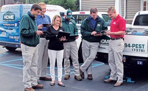 Glynnis Anderson trains the Home Pest Control staff and was instrumental in making the switch to a paperless office. Photo: Glynnis Anderson