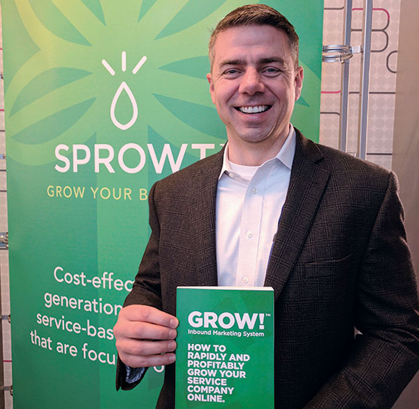 Donnie Shelton with his just-released book, Grow! Inbound Marketing System. 