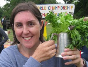 Tara Beasley and Larry the Snail holding their trophy. Photo: 2017 Mark Scase.