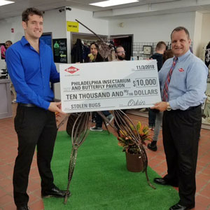 John Cambridge, owner of the Philadelphia Insectarium & Butterfly Pavilion, left, receives the check from Orkin Region Sales Manager David McDeavitt. PHOTO: ORKIN