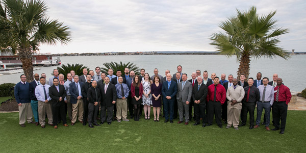 Versacor employees gather at the company's 2019 IMPACT meeting at Horseshoe Bay Resort to mark its 10th year in business. PHOTO: VERSACOR