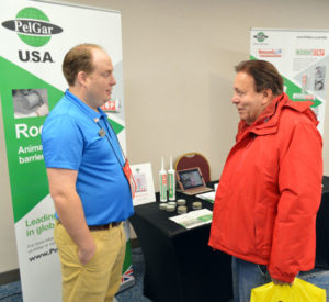 Andrej Branc, PelGar International's Americas Business Manager, discussing RodentStop at the 2019 New York Pest Expo. PHOTO: MARTY WHITFORD