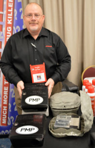 Craig Martelle, the Northeast Sales Manager for J.T. Eaton, demonstrates the product along with a PMP magnet! PHOTO: MARTY WHITFORD