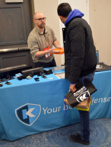 Joseph Belcher, Western US sales manager with Kness Manufacturing, shares information about the company's release of Krittersense. PHOTO: MARTY WHITFORD