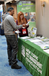 Attendees at the New York Pest Expo visited the New York Pest Management Association booth for information on upcoming regulatory matters. PHOTO: MARTY WHITFORD