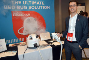 Tommaso Garavaglia, business development manager for Polti, demonstrating the Cimex Eradicator at the New York Pest Expo. PHOTO: MARTY WHITFORD