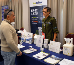 Vicki Holst, Reneotech Territory Rep, discussing Ecoraider with attendees at the 2019 New York Pest Expo. PHOTO: MARTY WHITFORD