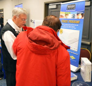 Will Poston, CEO of MattressSafe talks with an attendee at the 2019 New York Pest Expo. PHOTO: MARTY WHITFORD