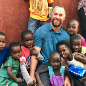 Kyle Finley with Ugandan children. PHOTO: KYLE FINLEY