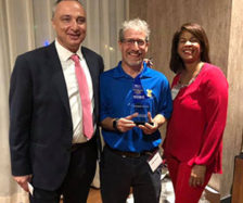 From left are Victor Aimi, the immediate past president for PRSA Greater Fort Lauderdale; Toby Srebnik; and Jennifer Hudson, the incoming chapter president. PHOTO: TRULY NOLEN