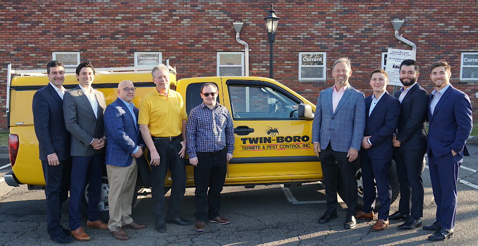 Pictured left to right: Sam Hagopian, Sam Hagopian III, Ryan Fowley, Ed Heller, Jerry Lubrano Jr., Stuart Aust, Daniel Aust, Nick Aust, and Chris Aust. Not pictured: Brady Lubrano. PHOTO: THE AUST GROUP