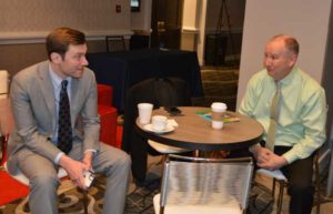 The NPMA's Director of Public Policy Jake Plevelich chats with PestVets' Marty Overline. PHOTO: PMP STAFF