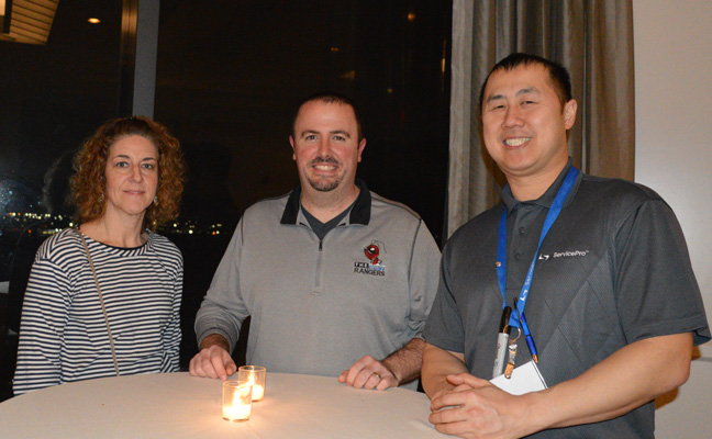 From left, Kendra Snyder of Quest Termite & Pest and Jeff King of The Pest Rangers take a break with ServicePro Director of Sales Ka Tsu. PHOTO: DIANE SOFRANEC/PMP