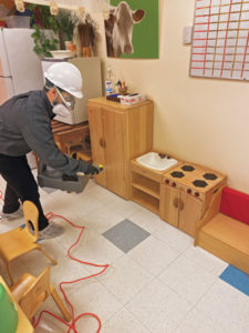 A B.B.B.K. technician prepares to disinfect children’s play furniture at a daycare. PHOTO: “BUGS” BURGER BUG KILLERS