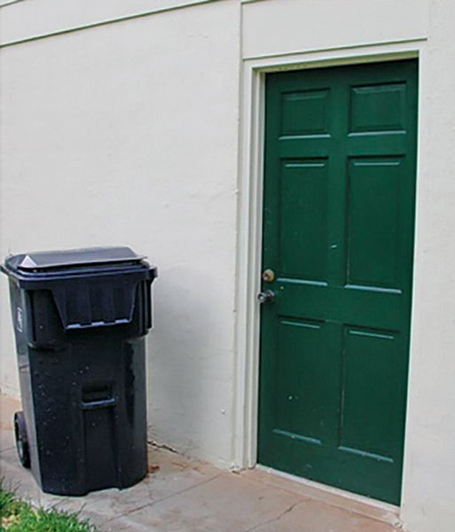 Odorous house ants (OHA) nested under the garbage can, which provided moisture from condensation, shade from the sun, protection from predators and close proximity to food. In the winter, the nest moved indoors, into a gap between the door frame and the block wall. PHOTO: UT E&PP