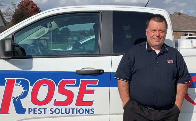 George Meacham stands in front of a Rose Pest Solutions truck. IMAGE: ROSE PEST SOLUTIONS