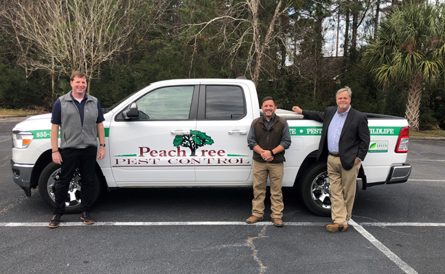 From left are Mike Givlin with Certus Pest, Jimmy Arnold with Peachtree and Rand Hollon. PHOTO: GEORGE TODD