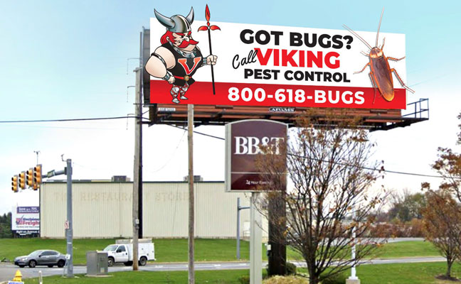 VIiking's longtime mascot is ready to face his foe, an oversized cockroach, in the company's latest billboard ad. IMAGE: VIKING PEST CONTROL