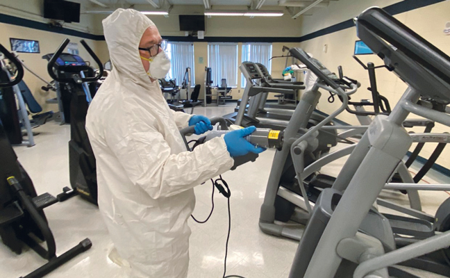 Quest Termite & Pest Solutions’ Chris Snyder has taken on new clients, like this gym, thanks to the disinfection service offering. PHOTO: QUEST TERMITE & PEST SOLUTIONS