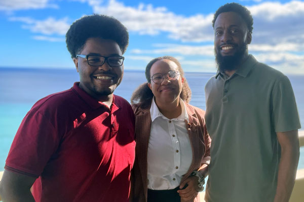 Also enjoying the reception are, from left, NPMA/MANRRS scholarship winners Mike Pagani, Christianburg, Va.; Jacquez Daniels, Tallahassee, Fla.; and Junior MANRRS Coordinator Ian Smith. Daniels and Pagani are learning more about pest control as a viable career path. PHOTO: PMP STAFF