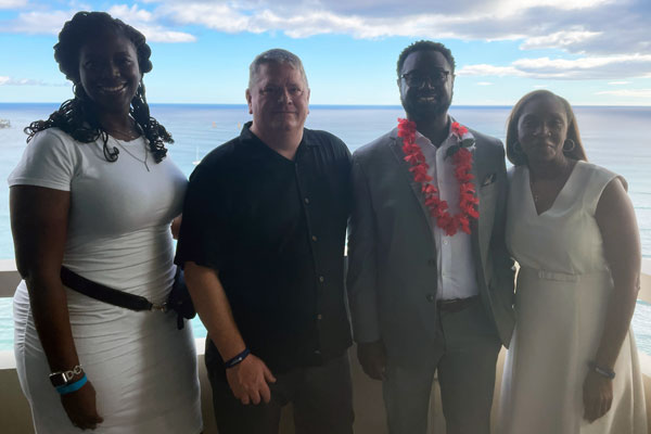 Chanel Braxton, left, is the NPMA's associate director of membership — as well as the staff liaison for the NPMA's Communities+ Diversity Council. Joining her on the balcony during the BOM reception are, from left, Jim Steed, owner of Neighborly Pest Management and advisor to BOM; BOM President Dr. Hamilton Allen, BCE, Florida region technical director of HomeTeam Pest Defense; and Faye Golden, director of governmental affairs for Cook's Pest Control, BOM treasurer, and NPMA VP. PHOTO: PMP STAFF
