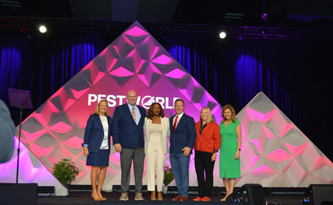 The 2024-2025 National Pest Management Association board of directors are, from left, President-Elect Emily Thomas Kendrick, Treasurer Mike Bullert, President Faye Golden, Secretary Bob Dold, Ex-Officio Dominique Stumpf, and Immediate Past President Marillian Missiti took the stage at Wednesday’s Opening General Session. PHOTO: PMP STAFF