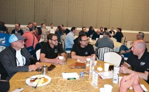 Attendees engage in insightful discussions with their peers during the roundtable breakfast. PHOTO: PMP STAFF
