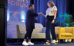 Award winner: FieldRoutes’ Michelle Ross presents Envu’s Debbie Koufas with an NPMA Impact Award for her 36 years as a research biologist. PHOTO: ENVU