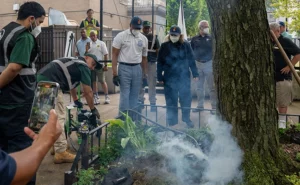 Mayor Adams (in the white shirt) and New York City Rat Czar Kathy Corradi observe with city workers as the group launched a new $877,000 initiative to combat rats in New York’s 600,000 street tree beds. PHOTO COURTESY OF NEW YORK CITY HALL