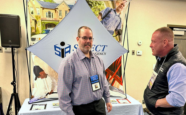 Frank MacDonald, SelectInsurance at his booth. IMAGE: PMP STAFF