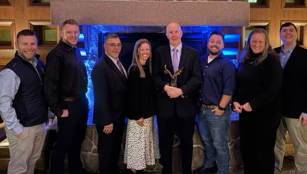 Jim O’Neil of Rentokil Terminix accepts the Bartlett W. Eldredge Award. IMAGE: NEPMA