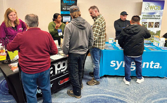 From left, featuring both established and new pest control tools are Catchmaster Pro’s Kim Geissel, northeast regional sales manager, and Stephanny Gomez, account management — pro lead. Staffing a neighboring booth is Syngenta Sales Manager Jonathan Davis. Three dozen industry suppliers showcased their solutions at the event