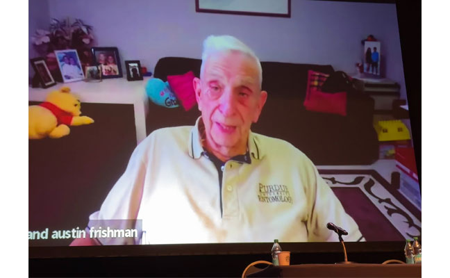 It goes with this caption: Doc Frishman recorded a special 90th anniversary message for all of the attendees of this year’s Purdue Pest Management Conference from his home in Florida.