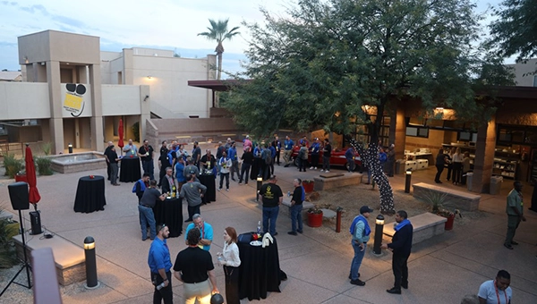 Attendees connect in the Roadies courtyard. IMAGE: TRULY NOLEN