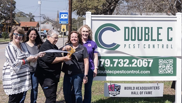 Members of the WIPC cut the ribbon in front of its new world HQ and HOF. IMAGE: WIPC