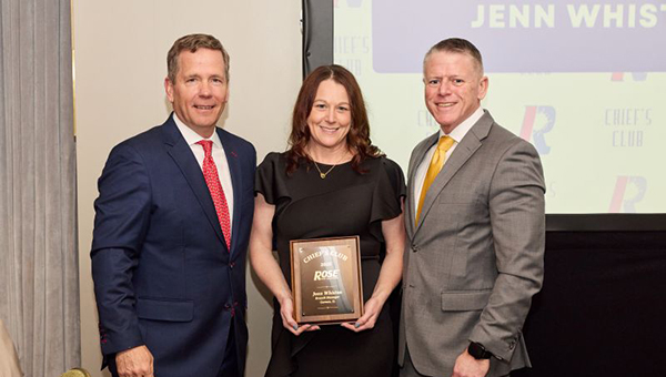 Bob Dold, owner and CEO of Rose Pest Solutions;  Jenn Whiston, Branch Manager of Rose Pest Solutions new Gurnee branch and award recipient; Curtis Rand, Rose Pest Solutions president.