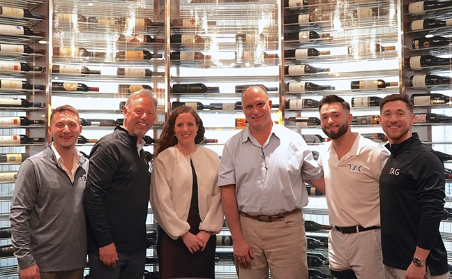 Pictured from left are Dan Aust, Stuart Aust, Mary Ballowe, Marty Ballowe, Nick Aust and Chris Aust. IMAGE: THE AUST GROUP