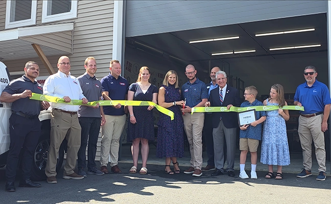 ribbon-cutting image of Thomas Pest team at the Saratoga branch.