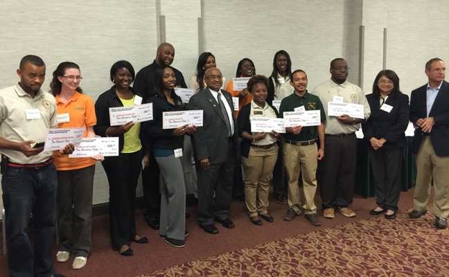 2014 SCHOLARSHIPS: Students, after being awarded the Capelouto Scholarship during 2014 field day. (PHOTO: JOHN DUKES III)