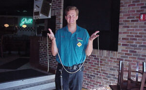 In this photo circa 1998, Adam’s Pest Control President Todd Leyse holds a sugar snake specimen. (Photo: Todd Leyse)