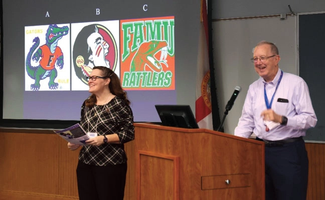 FLORIDA COLLEGE RIVALRY IS ON THE AGENDA: Dr. Rebecca Baldwin, director of the University of Florida (UF) Entomology and Nematology Education and Outreach Program, and UF Professor Emeritus Dr. Phil Koehler — also a PMP Hall of Famer (Class of 2015) — were among the speakers for the 2025 Field Day. (PHOTO: ANAMIKA SHARMA)