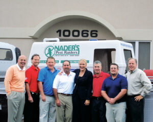 This photo accompanied the press release announcing the acquisition in 2010. From left are Jeff Singley, David Eason, Darrell Higgins, Randy Nader, Emily Thomas Kendrick, Kevin Coyne, Jake Lauderdale and Kevin Burns. (Photo: Arrow Exterminators)